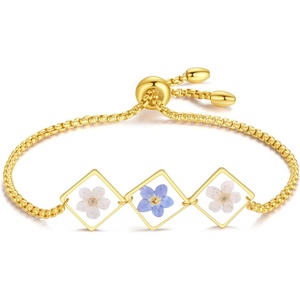image:imageAUNTESIGN ForgetMeNot Pressed Wildflower Bracelet  Pressed Flower Bracelet  GoldSilver Pressed Flower Jewelry  Personalized Handmade Jewelry  Gift For WomenForgetmenot and daffodil bracelet